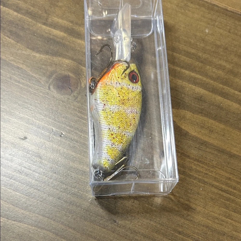 Yellow Fishing Lure with Red Accents